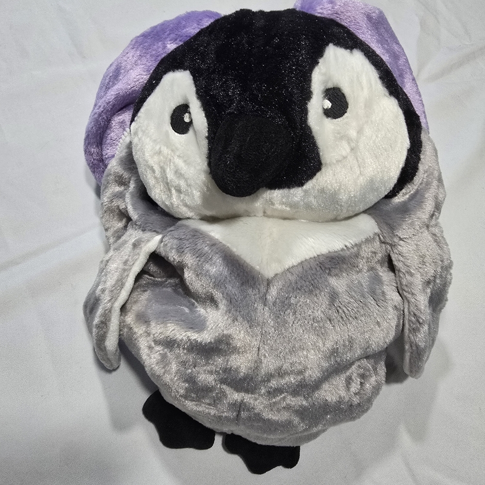 Reversable SeaWorld pillow/ penguin plushy